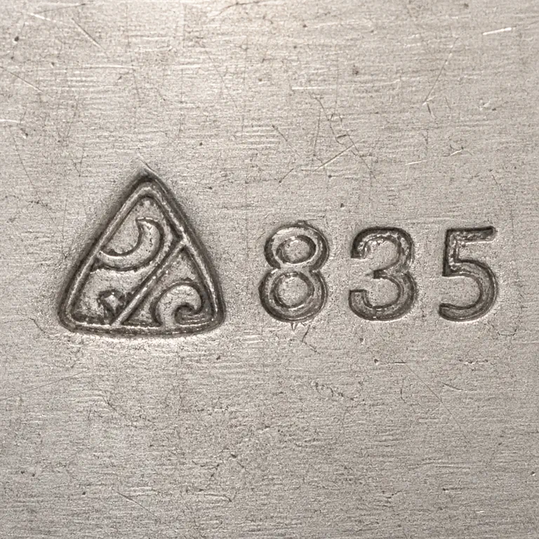 Richard Köberlin: Pointed triangular punch with broad curled and diagonal interior fragments followed by exact 835. watermark removed; oxidized reconstruction.