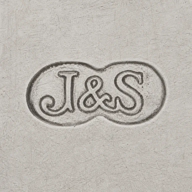 Jones & Son: Square contour reconstruction preserves the joined oval/capsule frame and supported J, ampersand-like, and S forms in order; oxidized reconstruction.