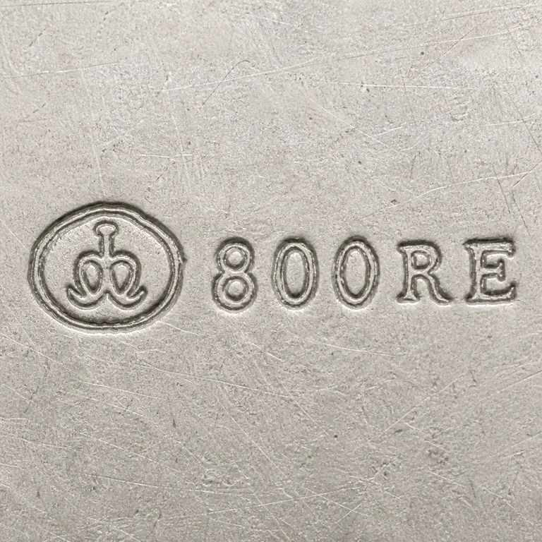 looking for info: Round looped emblem and exact 800RE without the photographic rectangular crop boundary; oxidized reconstruction.