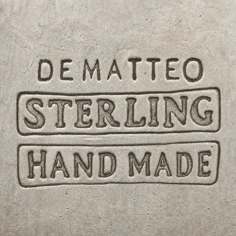 William G. DeMatteo (1895-1980): DeMatteo; oxidized reconstruction.