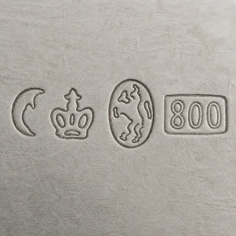 Richard Köberlin: Crescent, crown-like punch, oval with separated irregular fragments, and exact 800 in a rectangular punch; oxidized reconstruction.