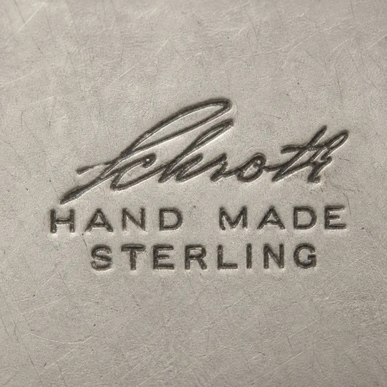 Schroth Jewelers: Schroth, Hand Made, Sterling; oxidized reconstruction.