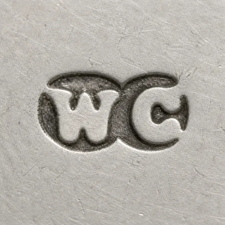 William Carter: Square contour reconstruction preserves the paired joined W/C-like silhouette, central join, and horizontal orientation; oxidized reconstruction.