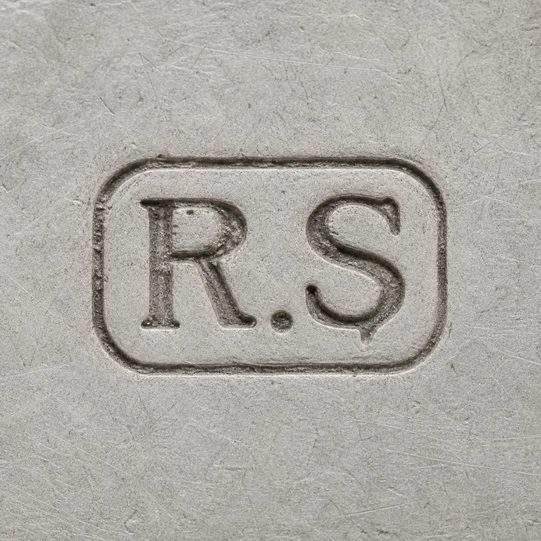R S: Visible R.period.S sequence and rounded rectangular cartouche; oxidized reconstruction.
