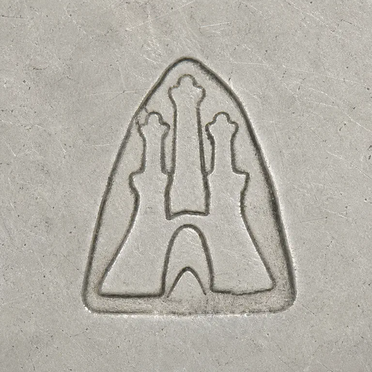 Hamburg Silver Marks: Triangular border, three tower-like upper forms, and lower A-like arch; oxidized reconstruction.