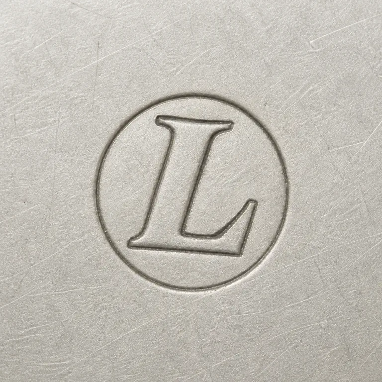 Julius Lemor: Single circular punch and slanted serif L; oxidized reconstruction.