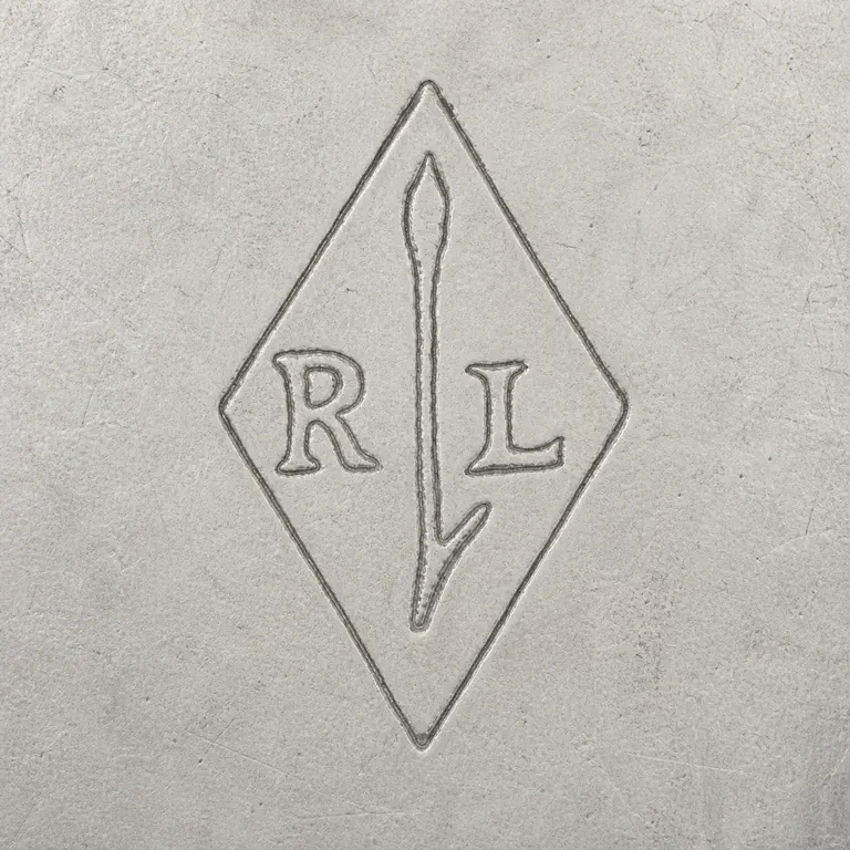 Rudolphe Beunke: Vertical diamond with R at left, L at right, a tall narrow pointed central stem, and a lower fork-like branch; oxidized reconstruction.