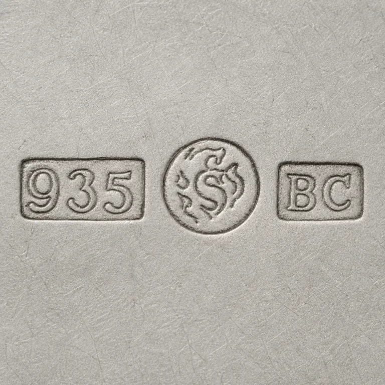 looking for info: Visible text, numerals, symbol order, and source-bounded device geometry; oxidized reconstruction.