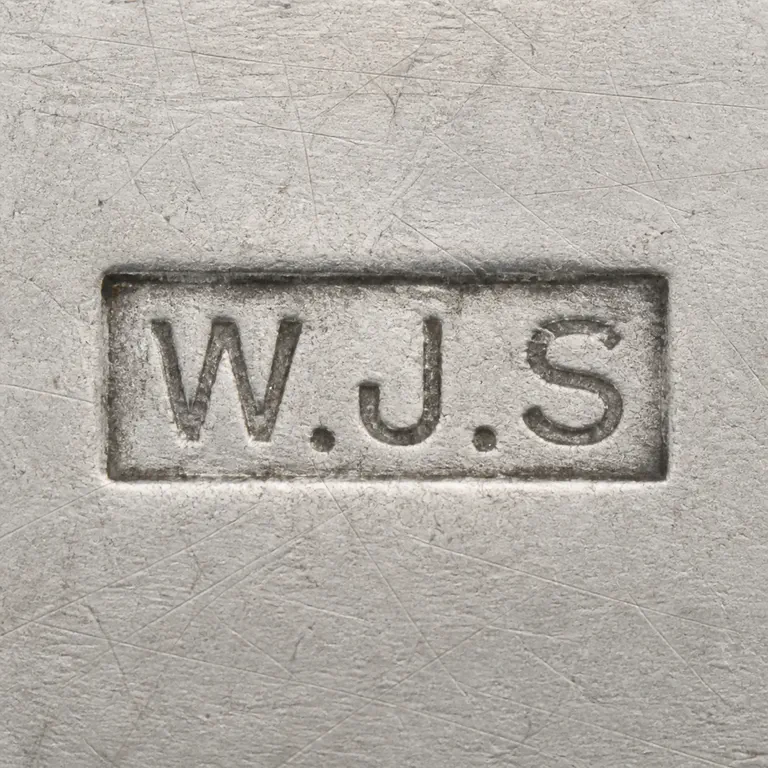 W J Sutton Ltd: W.J.S sequence with two periods and one rectangular cartouche in line-only form; oxidized reconstruction.