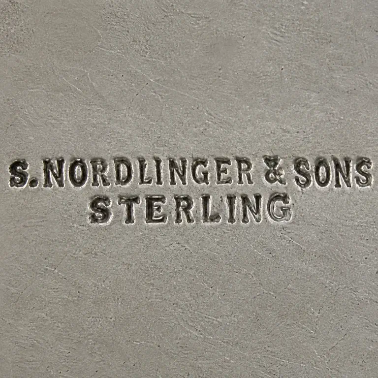 Simon Nordlinger & Sons: S.Nordlinger & Sons; oxidized reconstruction.