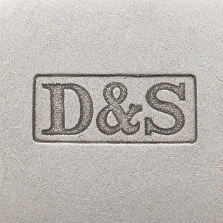 James Dixon & Son: D&S in bold serif capitals with one ampersand, inside one narrow horizontal rectangular cartouche; oxidized reconstruction.