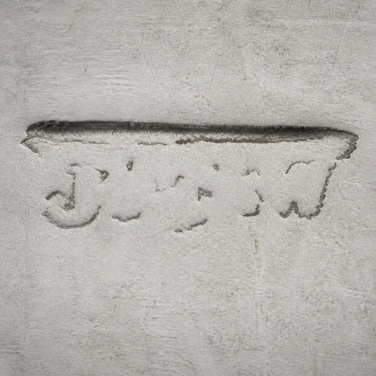 John Eli Weetman: Long upper dark edge and disconnected lower fragments without readable lettering, object completion, or invented border; oxidized reconstruction.