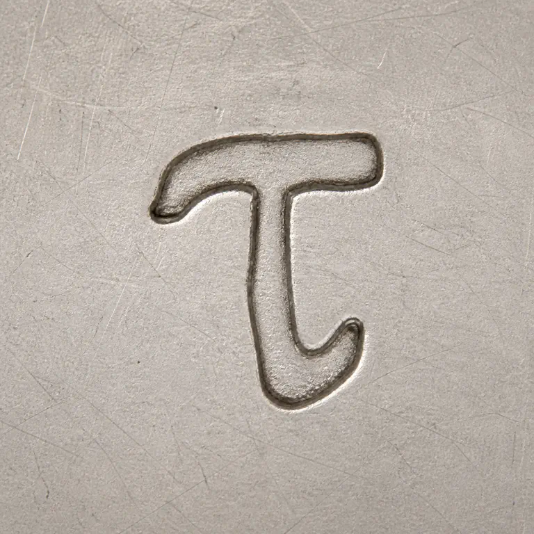 St. Petersburg: One isolated tau-like glyph with a horizontal top bar, central descending stem, and lower-right hook; oxidized reconstruction.