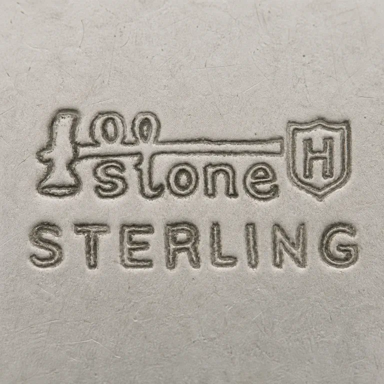 Stone Associates: Stone, Hammer, H shield; oxidized reconstruction.