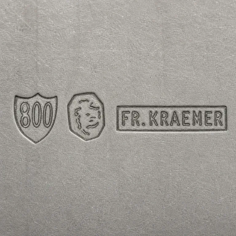 Richard Köberlin: Shield punch with exact 800-like digits, central polygon with disconnected abstract fragments, and exact FR. KRAEMER word punch; oxidized reconstruction.