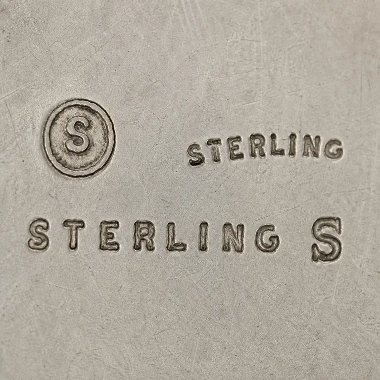 Shepard Mfg. Co.: S, Sterling; oxidized reconstruction.