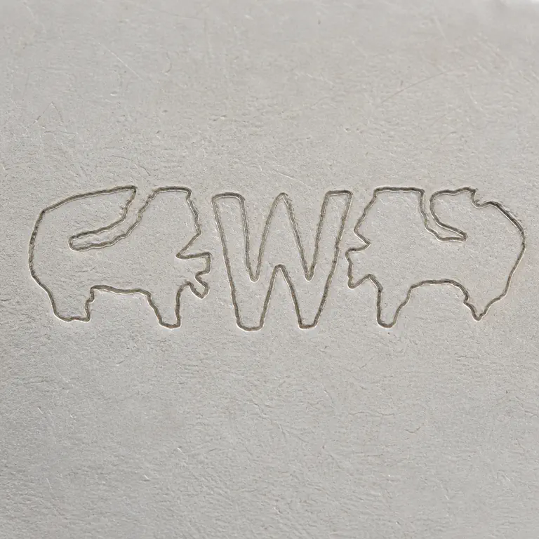 Wendell Manufacturing Co.: W, lion; oxidized reconstruction.
