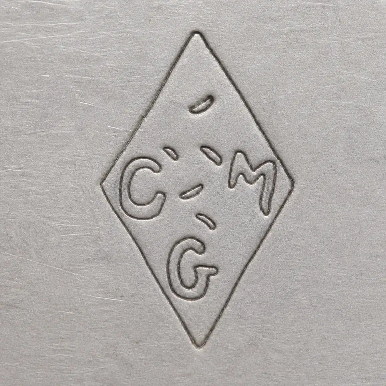 Maison Cardeilhac: Tall diamond punch with C-like left, M-like right, G-like lower, and five disconnected central worn strokes; oxidized reconstruction.