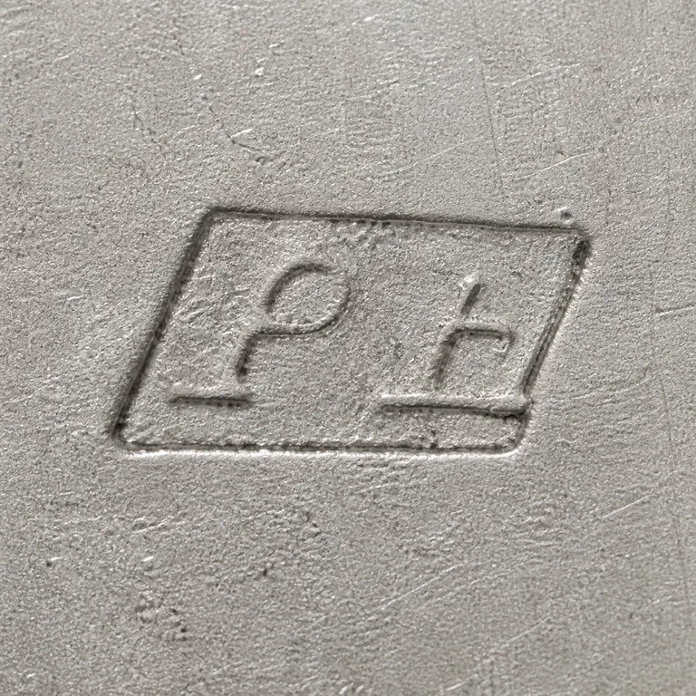P H: A horizontal worn rectangular outline is reconstructed with two separate P/H-like internal contour groups and no invented label; oxidized reconstruction.