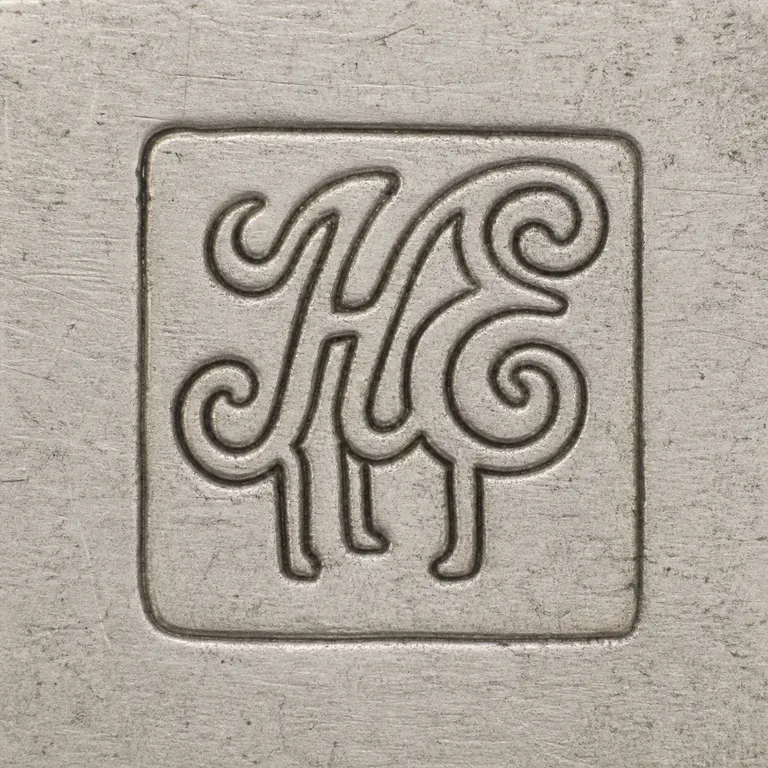 Hawksworth, Eyre & Co. Ltd.: An intertwined uppercase H and E monogram with shared sweeping strokes and lower vertical terminals, centered inside one compact near-squ…; oxidized reconstruction.