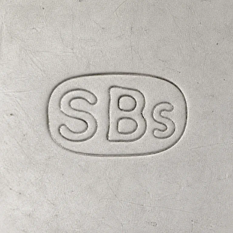 Sandheim Brothers: Oval punch, S-B-small-terminal sequence, upright orientation, and relative spacing; oxidized reconstruction.