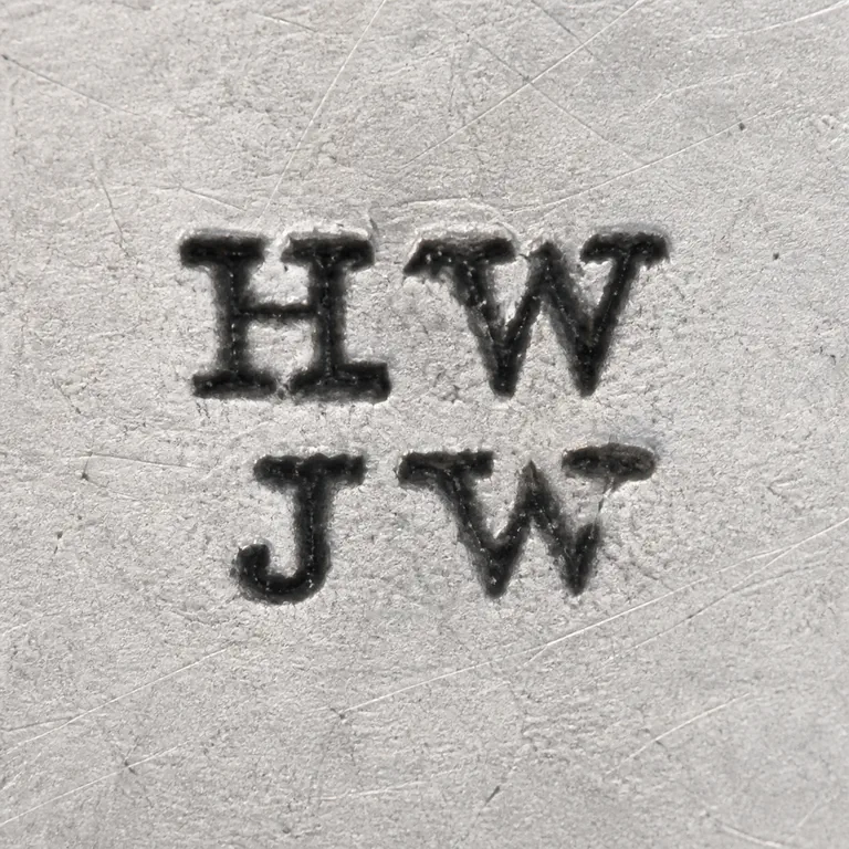 Henry & Joseph Webb: Open two-row HW over JW grouping is reconstructed with row alignment, relative spacing, and no invented enclosing border; oxidized reconstruction.