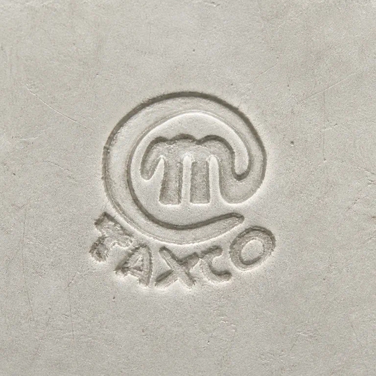 Miguel Melendez Marks, Bio & Work Examples: One integrated circular device preserves a lowercase m-like monogram within its circle shallow lower TAXCO-like contours; oxidized reconstruction.