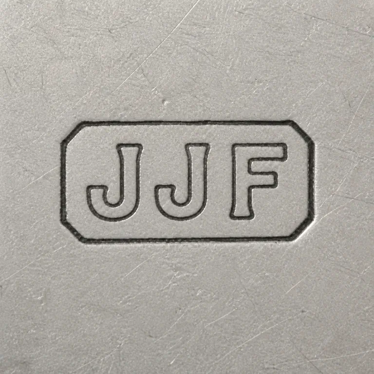 Jeffrey John Francis: J J F arranged left to right inside one compact worn rectangular cartouche; oxidized reconstruction.