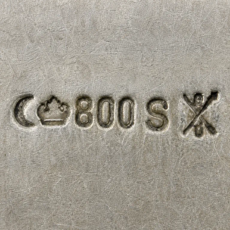 Richard Köberlin: Crescent, crown-like punch, exact 800, exact uppercase S, and crossed terminal with loop fragments; oxidized reconstruction.