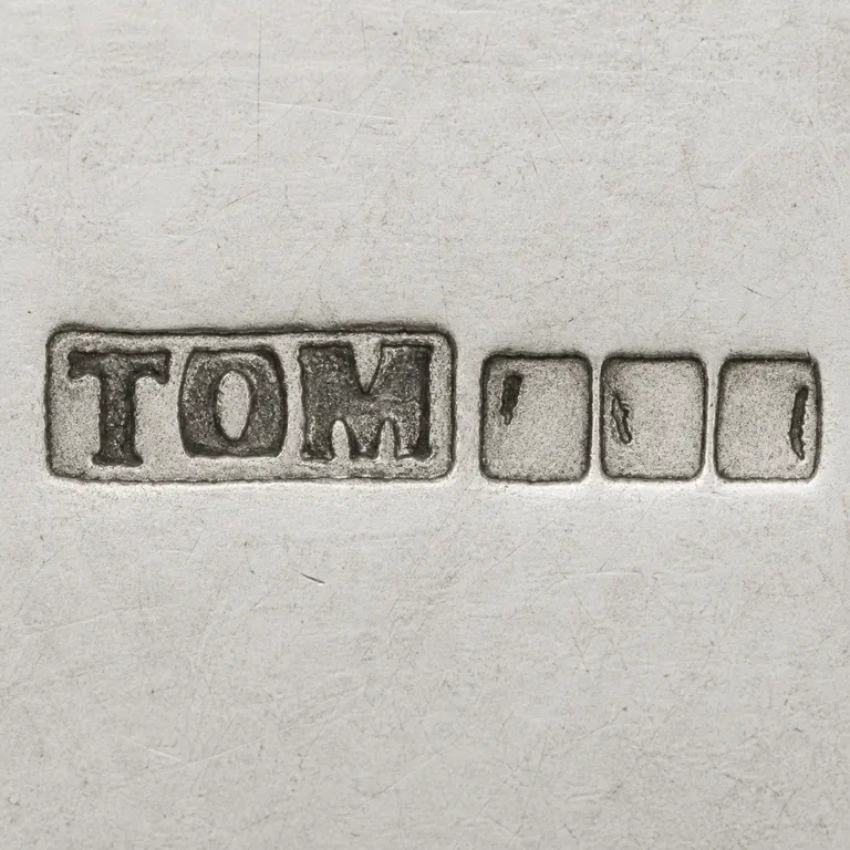 Typical Yogya Silver Marks: The long TOM cartouche and three separate following square punches preserve source order and count; each square retains only one sparse u…; oxidized reconstruction.