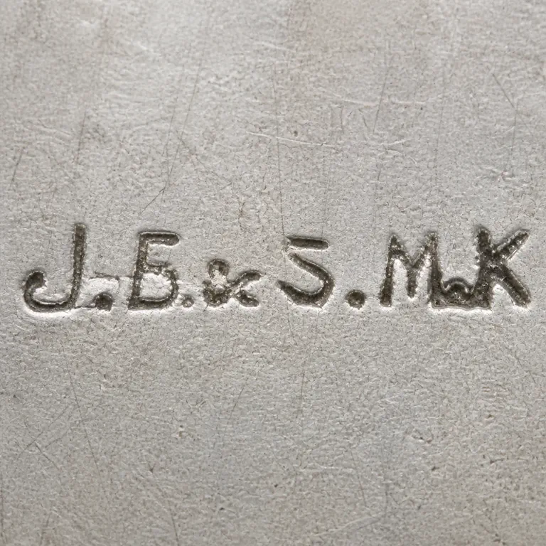 J.B. & S.M. Knowles: JB&SMK · Knowles Sterling; oxidized reconstruction.