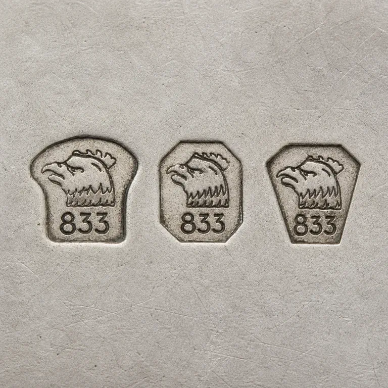 Large Articles FIRST STANDARD .916 Large Articles SECOND STANDARD .833: small mark 833 silver; oxidized reconstruction.