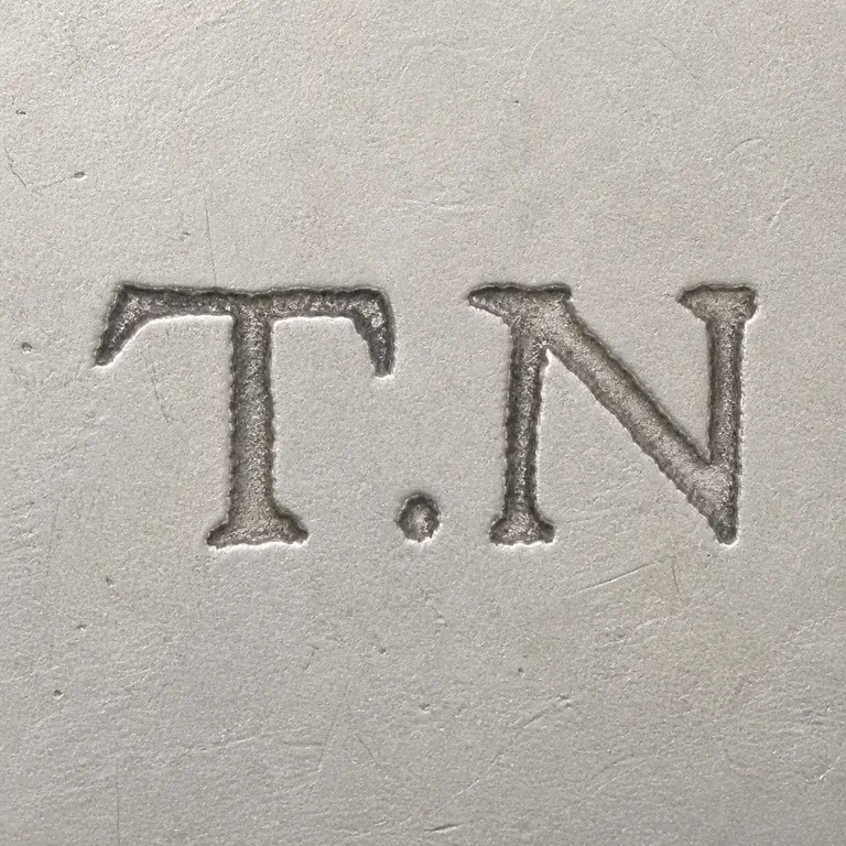 Thomas Norton: T.N; oxidized reconstruction.