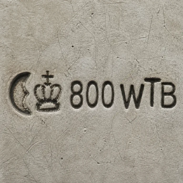 Robert Altermann: Crescent-like arcs, crowned standard mark, 800, and WTB monogram; oxidized reconstruction.