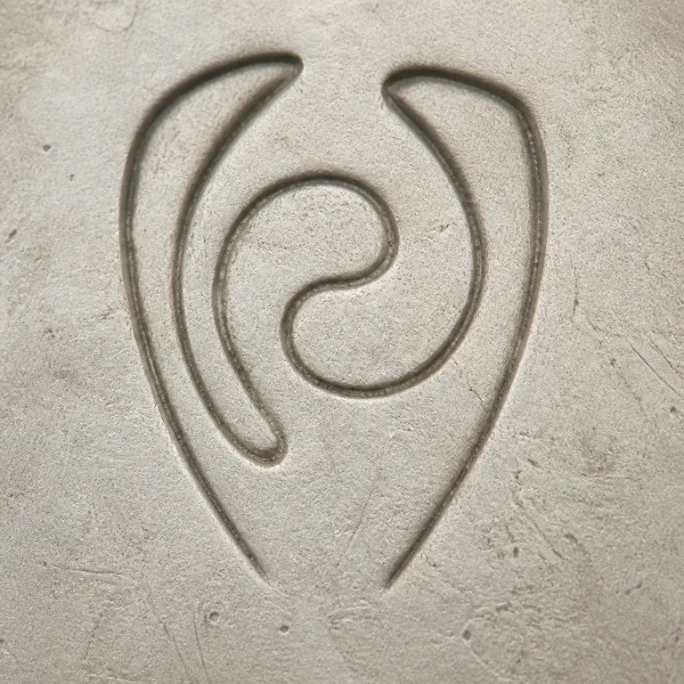 Phyllis Sklar: Two open outer curves surround the supported central spiral-like loop with no text or crop boundary; oxidized reconstruction.