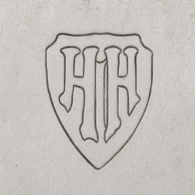 H H: Source-bounded low-confidence contour preserves the visible mark geometry and supported lettering or device; oxidized reconstruction.