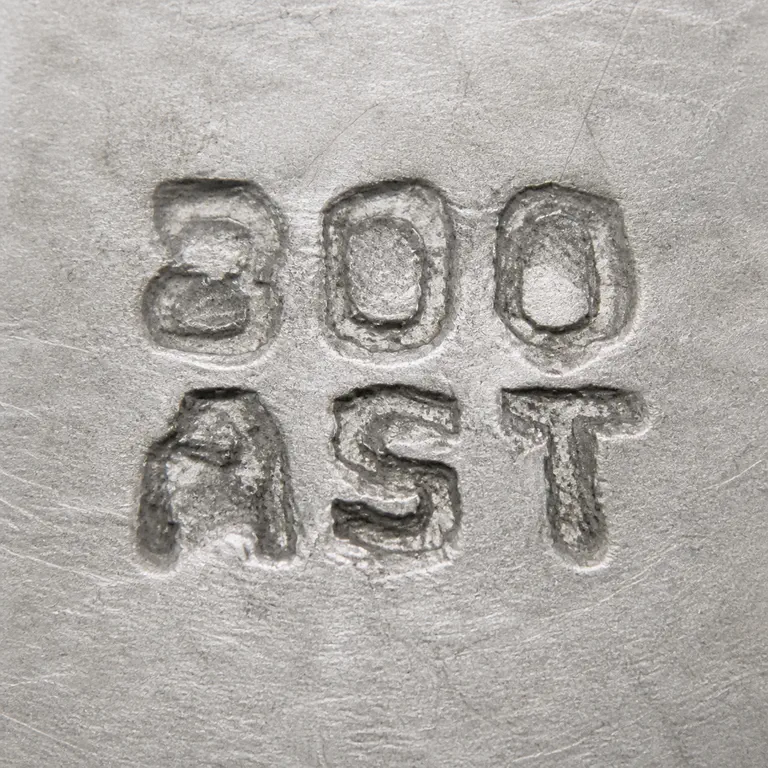 Typical Yogya Silver Marks: The open two-line composition preserves exact 300 over AST character order, alignment, and worn irregular stroke treatment without an inv…; oxidized reconstruction.