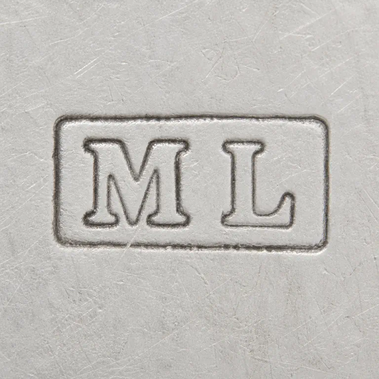 Montague Levyson: Corrected output preserves separate M and L forms left to right inside one thin worn rectangular cartouche, without filled-border artifac…; oxidized reconstruction.