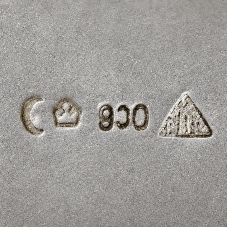 Robert Altermann: Crescent, crown, 930, and triangular BR-like punch in source order; oxidized reconstruction.