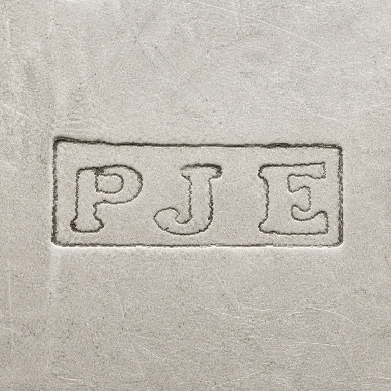 Paul Joachim Eisenmann: Square master preserves the P/J/E-like group in a compact rectangular punch with source-consistent spacing and border; internal script fi…; oxidized reconstruction.