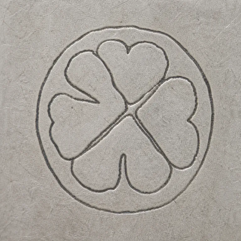 Howard Sterling Company: four leaf clover; oxidized reconstruction.