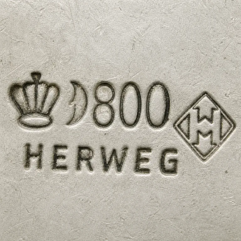 looking for info: Crown, crescent, exact 800, HERWEG, divided lozenge terminal in source order; oxidized reconstruction.