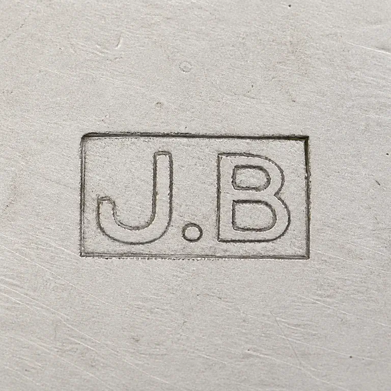 J B: J.B in the supported compact mark with a clean contour; oxidized reconstruction.