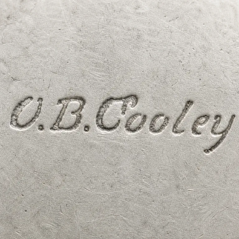 Oliver B. Cooley: O.B.Cooley; oxidized reconstruction.