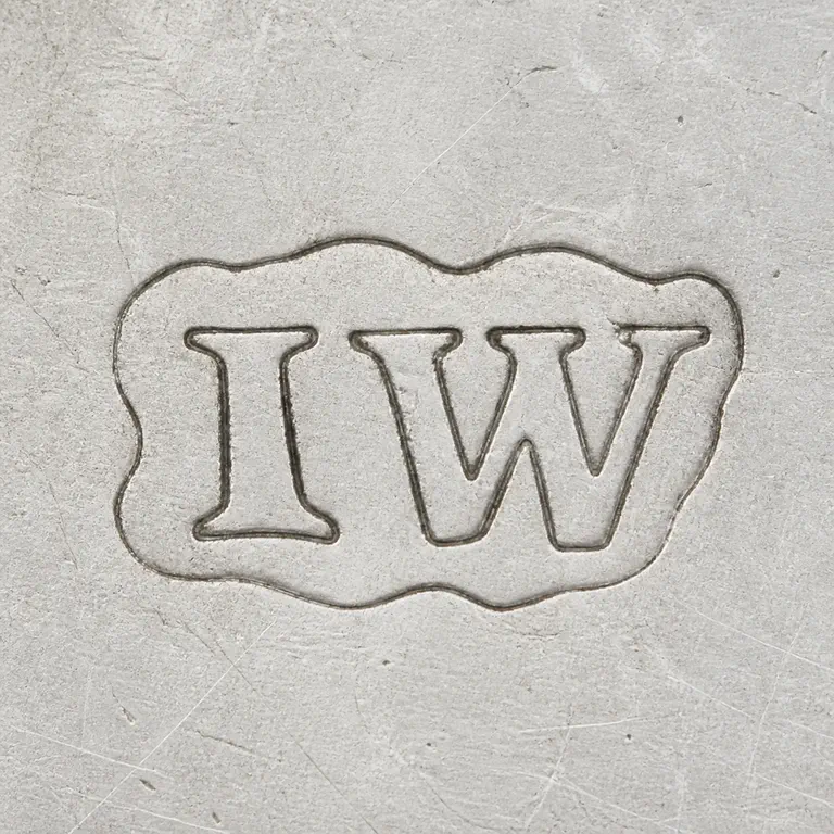 John White (I): Visible I and W glyphs in order inside the small worn cartouche; oxidized reconstruction.