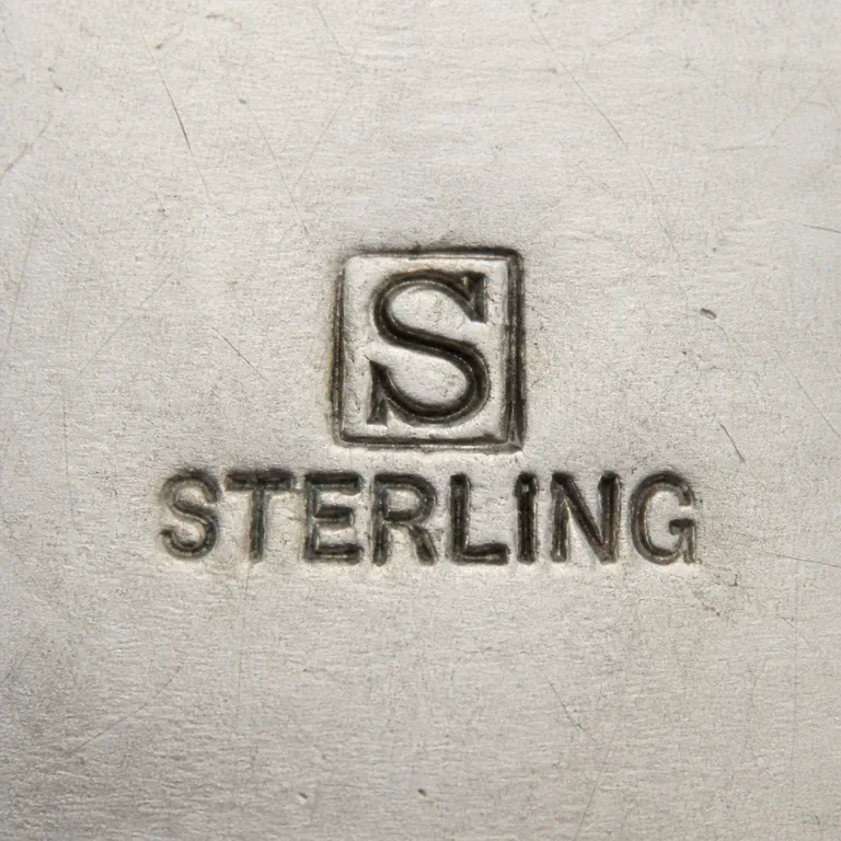 Victor Seidman Mfg. Co.: S, square; oxidized reconstruction.