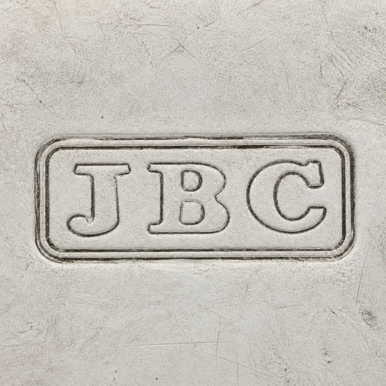 John Blackwood Caw: Preserves the double rounded border and J/B/C-like sequence in the source order and orientation with no fill, label, or watermark; oxidized reconstruction.