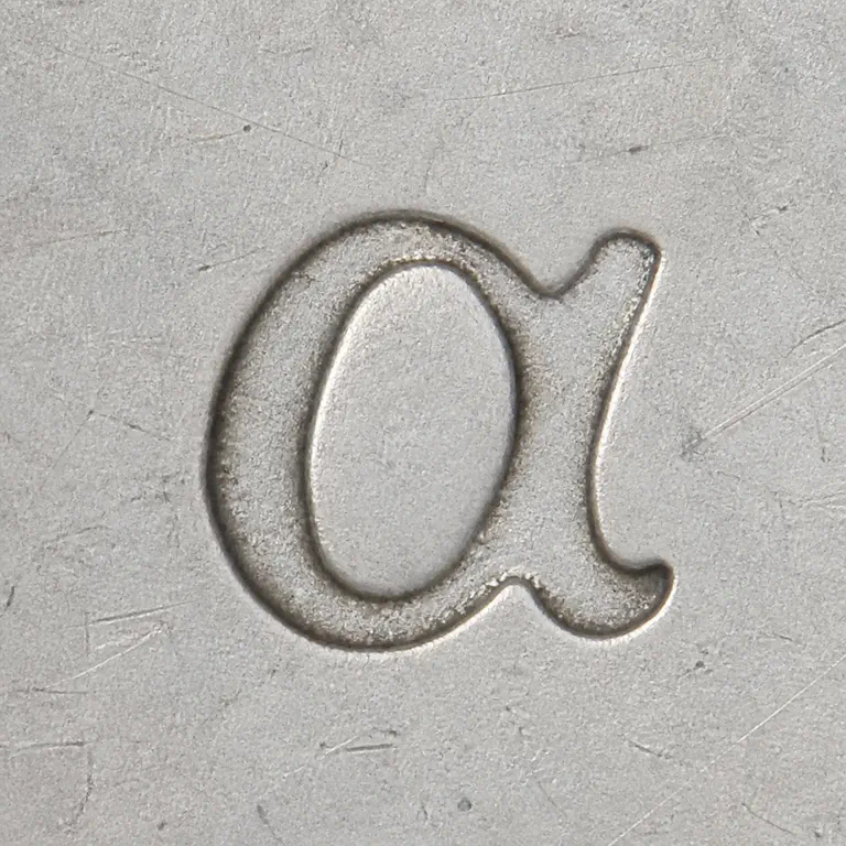 St. Petersburg: One isolated alpha-like glyph with a looped left bowl and rising right stroke; oxidized reconstruction.