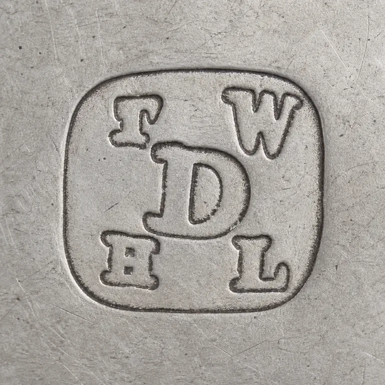 Thomas William, Henry & Louis Dee: Multi-form TWDHL arrangement retained within the rounded boundary; oxidized reconstruction.
