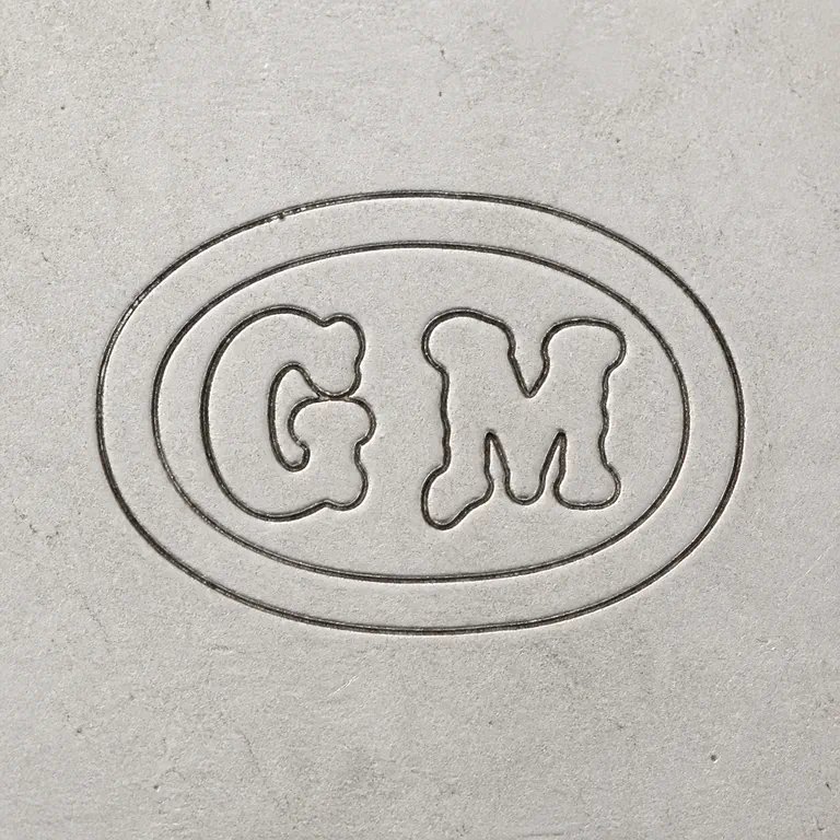 Gustav Mayer: Unfilled nested oval plaque with supported G-M-like forms in left-to-right order; oxidized reconstruction.